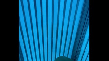 KEVIN V PLAYS WITH DILDO IN A PUBLIC TANNING BED CHASTITY