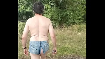 Exhibitionist walks in country in skimpy denim shorts