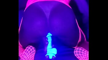 Sissy in neon lingerie takes a blue cock