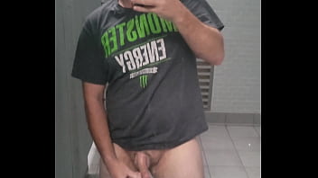 Playing with my dick in a public bathroom