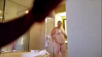 Steve Krug scrubs my fat ass in a resort room in Florida.
