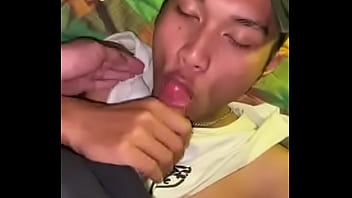 Indonesian young boy sucking big Cock