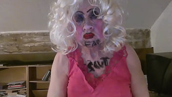CD Sissy Sarah Millward knows her ID, as indicated by what'_s written on her face and chest - '_fag slut'_ - as she smokes, wanks her clit, and stuffs a dildo up her nasty lady hole