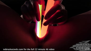 hot teen gets naked and opens up her pussy with glowsticks kinky object insertions